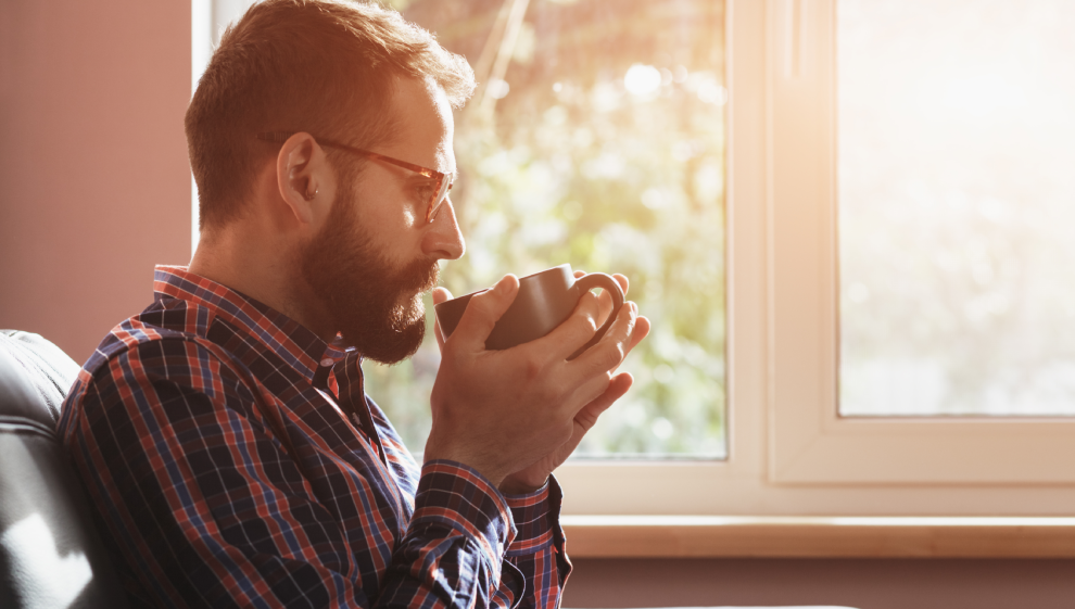 Drinking a hot drink during a cold day