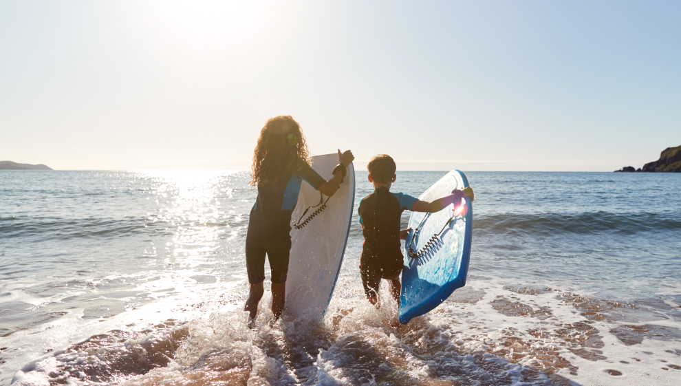 A mum and daughter go surfing